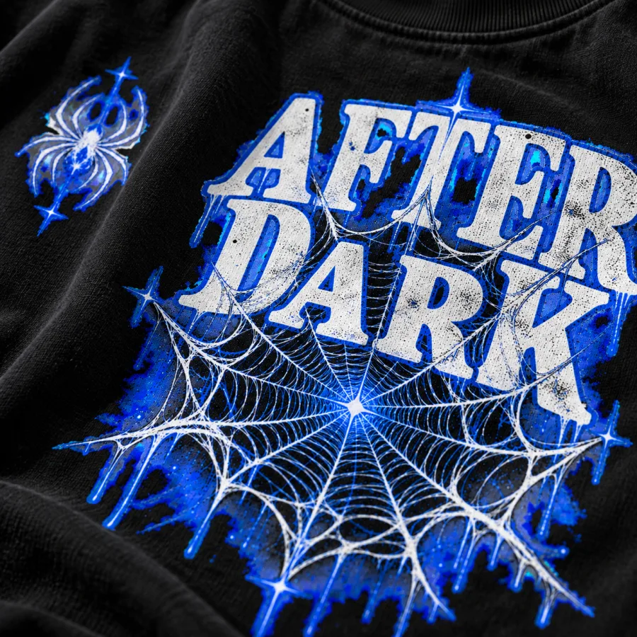 Close-up of white and electric blue web lines crossing the AFTER DARK letters