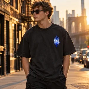 Skater in After Dark Web tee at a skate park under night lights