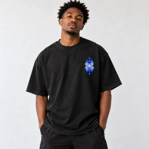 Model wearing oversized black After Dark Web spider streetwear shirt