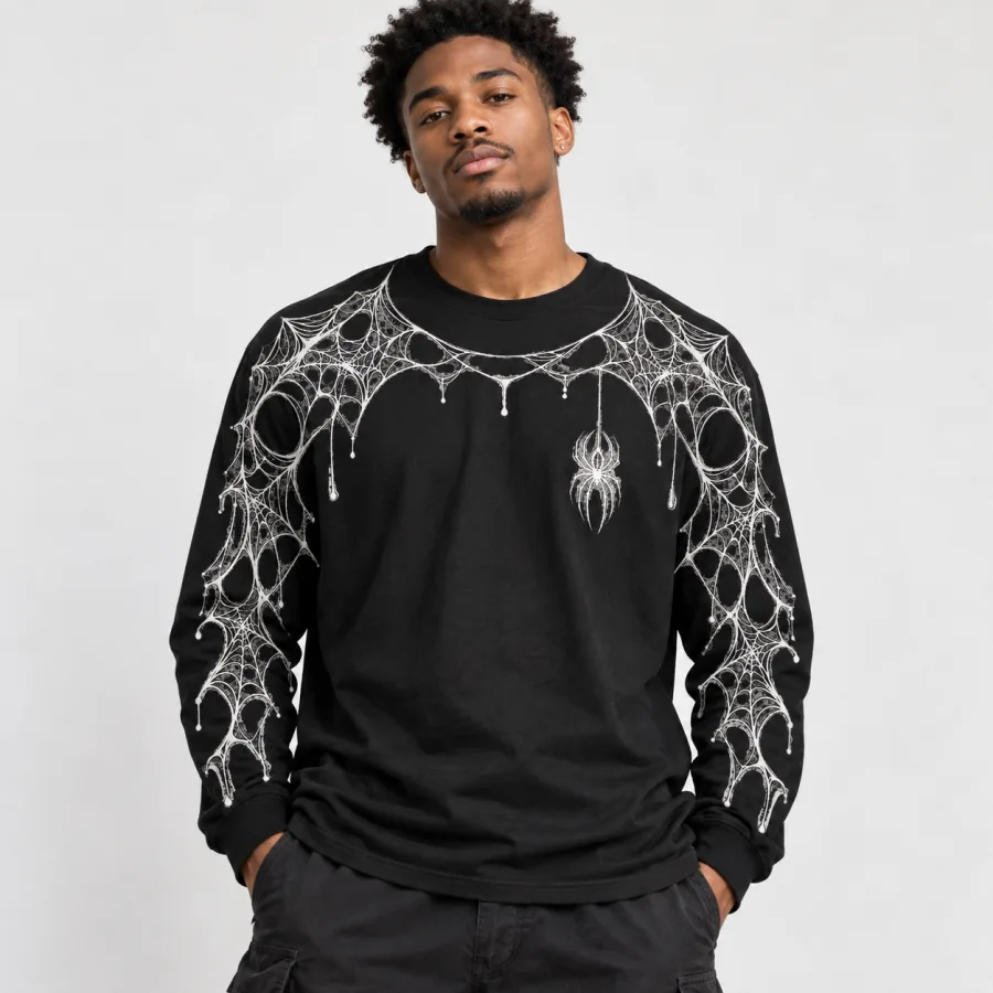 Model wearing black Arm Web System spider web long sleeve shirt with white sleeve web artwork
