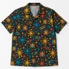 Front flat lay of charcoal Atomic Spider Repeat retro spider button up shirt with mustard turquoise and rust atomic print
