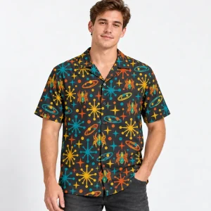 Model wearing charcoal Atomic Spider Repeat retro spider button up shirt with geometric spiders and starbursts