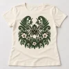 Front flat lay of cream women's Botanical Spider floral spider shirt with forest-green fern and wildflower artwork