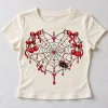 Front flat lay of soft cream Cherry Web Heart cute spider shirt for women