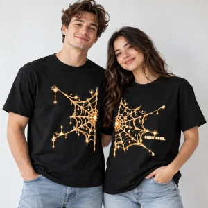 Woman wearing black Connected Web Right tee with the web reaching to her left