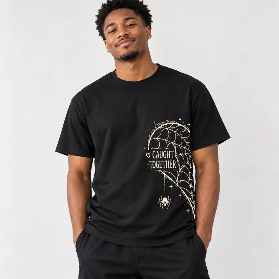Model wearing black Couple Web Left spider Halloween couple shirt with cream side web artwork
