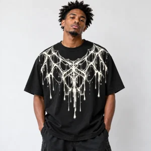 Model wearing black Dripping Web dripping spider web shirt in a boxy fit