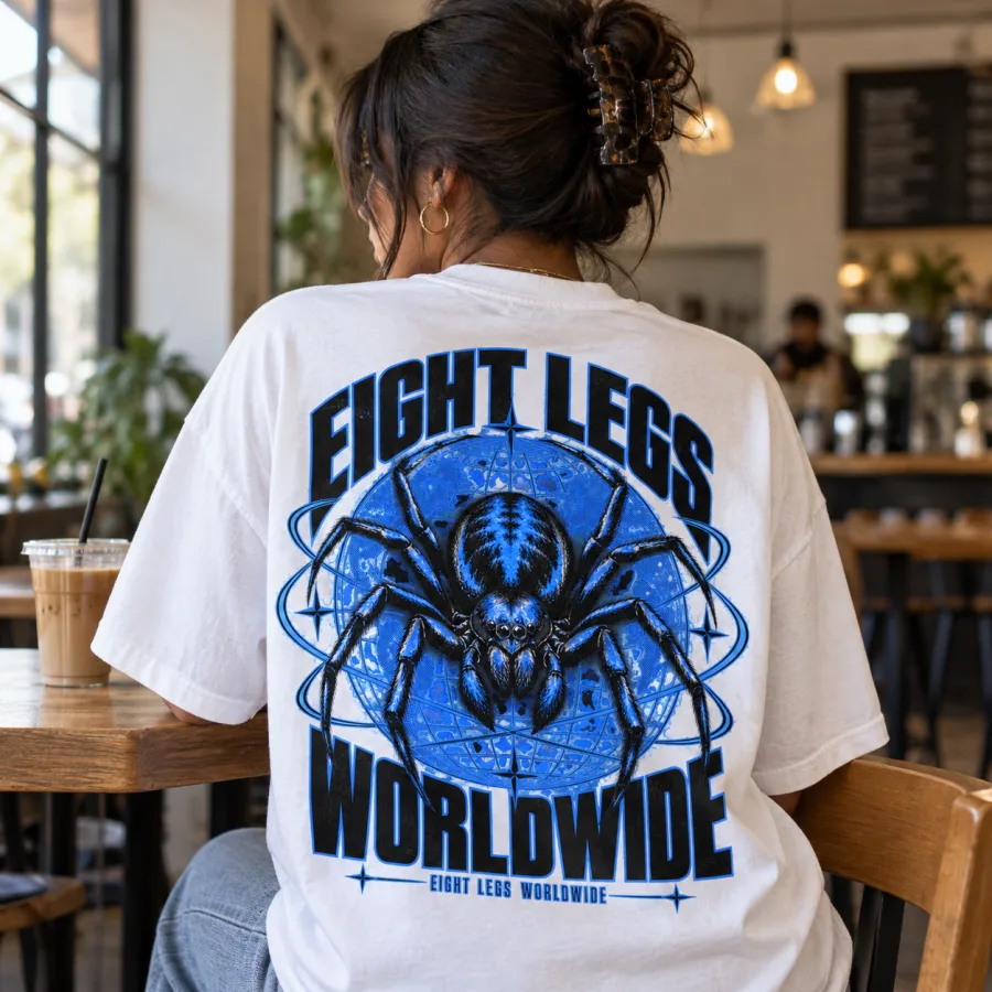 Back view of Eight Legs Worldwide tee showing spider, globe grid and lettering