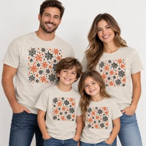Heather oatmeal Family Web Pattern family spider web shirt displayed on a natural wooden hanger