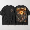 Front flat lay of washed black oversized Haunted City Web tee showing the small spider chest print