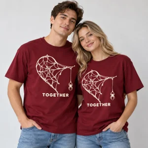 Man wearing burgundy Heart Web Pair Left tee with the half heart print