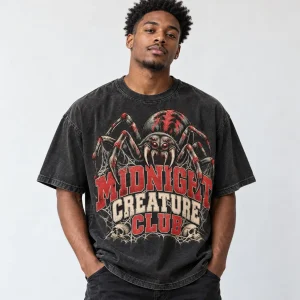 Woman wearing washed black Midnight Creature Club tee with faded jeans