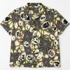 Front flat lay of Midnight Orb Repeat black spider web button up shirt with cream all-over orb webs and tiny spiders