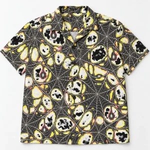 Front flat lay of Midnight Orb Repeat black spider web button up shirt with cream all-over orb webs and tiny spiders