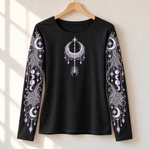Black women's Moon Web Arms celestial spider long sleeve shirt displayed on a wooden hanger with detailed printed sleeves
