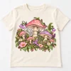 Front flat lay of light cream kids Pastel Web Garden cute spider web shirt with pastel mushrooms, flowers and leaves