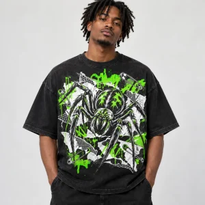 Folded black punk spider shirt showing collage print