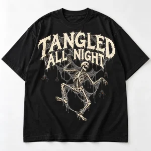 Front flat lay of black oversized skeleton spider shirt with TANGLED ALL NIGHT dancing skeleton and web print