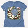 Front flat lay of dusty blue women's Snow Web Garden floral Christmas spider shirt