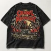 Front flat lay of washed black oversized Spider Horror Feature retro horror spider shirt with giant spider and farmhouse artwork