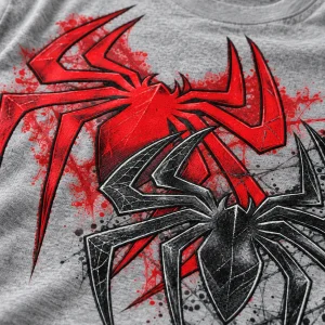 Close-up of red and black overlapping spider emblems printed on heather gray cotton