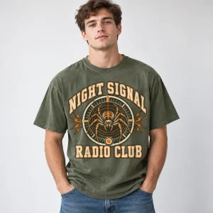 Model wearing faded olive Spider Radio Club tee