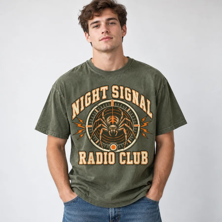 Model wearing faded olive Spider Radio Club tee