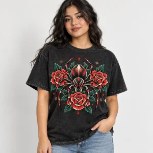 Latina woman wearing washed black Tattoo Flash Spider tattoo spider shirt in a studio