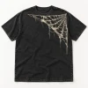 Front flat lay of washed black Vintage Corner Web vintage spider web shirt with distressed cream corner web print