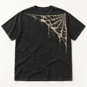 Front flat lay of washed black Vintage Corner Web vintage spider web shirt with distressed cream corner web print
