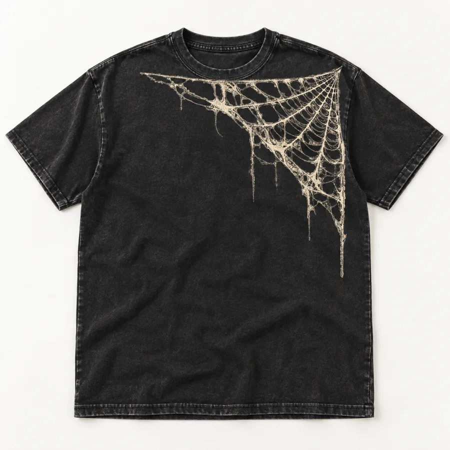 Front flat lay of washed black Vintage Corner Web vintage spider web shirt with distressed cream corner web print