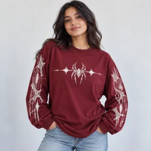 Model wearing oversized burgundy Web Frequency spider long sleeve shirt