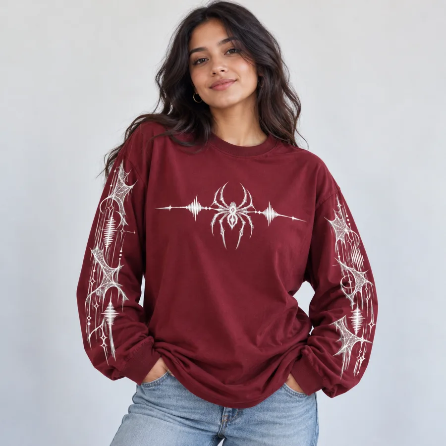 Model wearing oversized burgundy Web Frequency spider long sleeve shirt