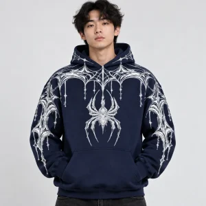 Model wearing deep navy Web Hood System spider web print hoodie with white web graphics across shoulders and sleeves
