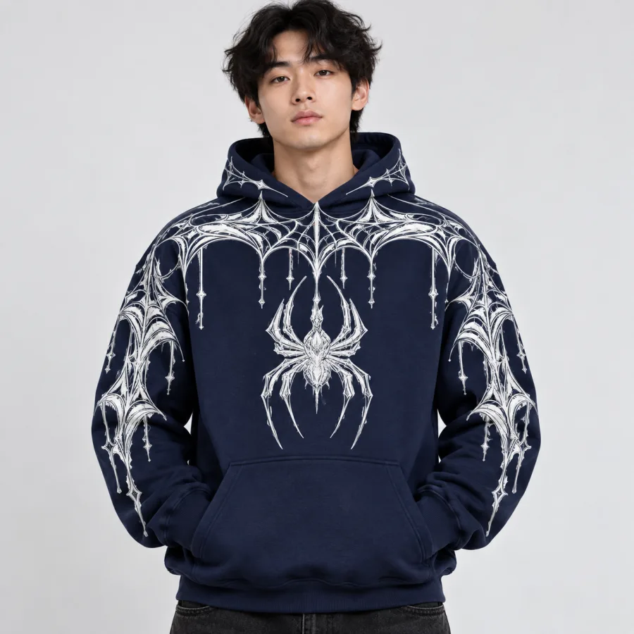 Model wearing deep navy Web Hood System spider web print hoodie with white web graphics across shoulders and sleeves