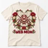 Front flat lay of Natural Web Mom Garden spider mom shirt with floral heart-shaped web artwork