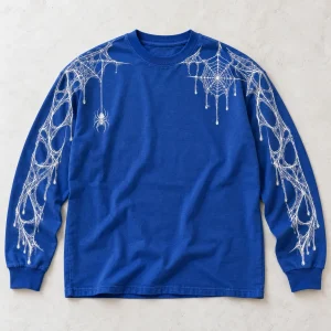 Front flat lay of cobalt blue Web Sleeve System long sleeve with tiny spider